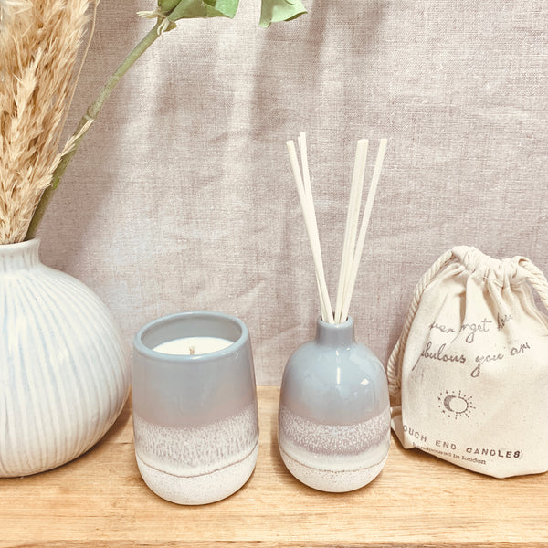 GREY OMBRE GLAZED CANDLE AND DIFFUSER ON WOODEN SHELF WITH ECO COTTON GIFT BAG